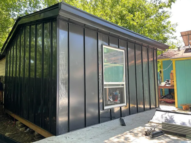 Black standing seam metal wall panels for Roof Inspection in Batesville