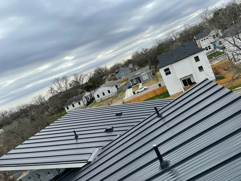Standing seam metal roof panels with vents for Skylight Repair in Batesville